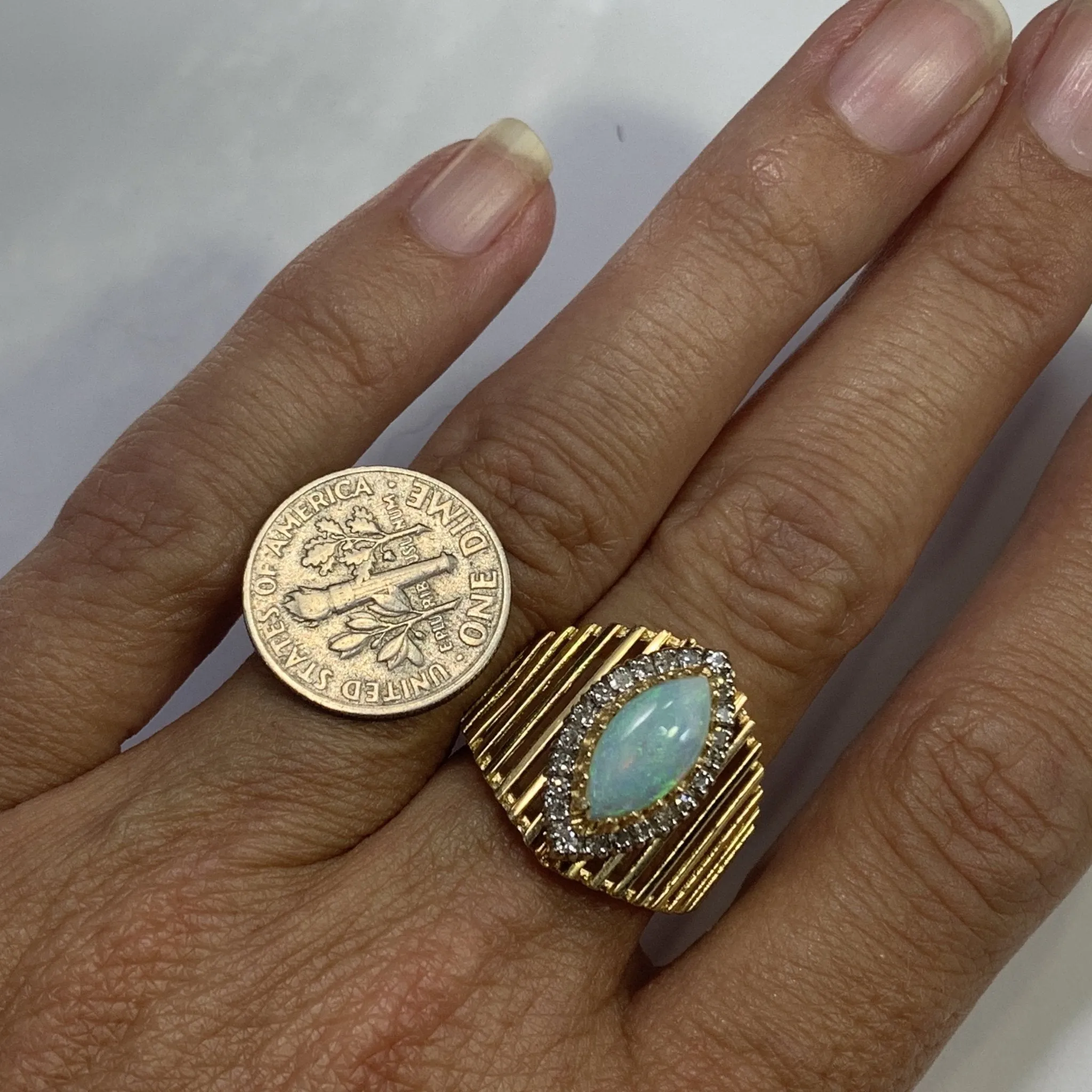 1970s Opal and Diamond Halo Statement Ring in a Large 14K Yellow Gold Setting.